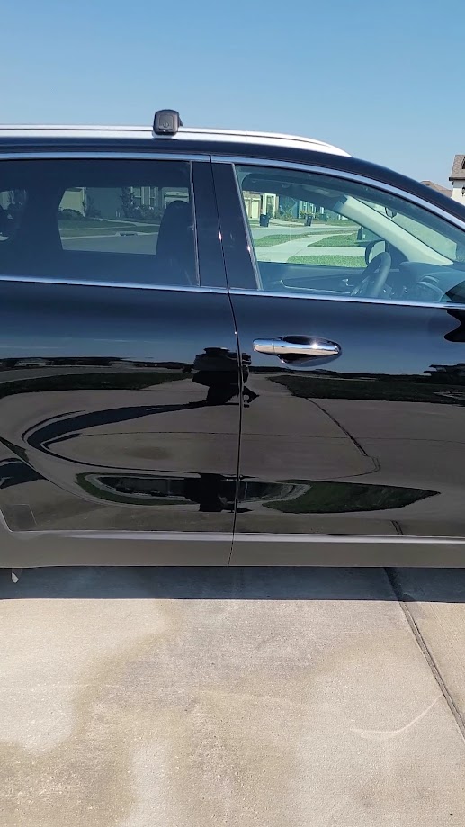 Black Infiniti — door and mirror finish